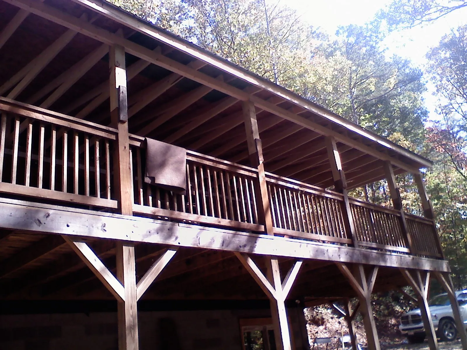 Timber framing under a new elevated porch and deck — Roof Leak Repair in Curtice by Roofing Brothers